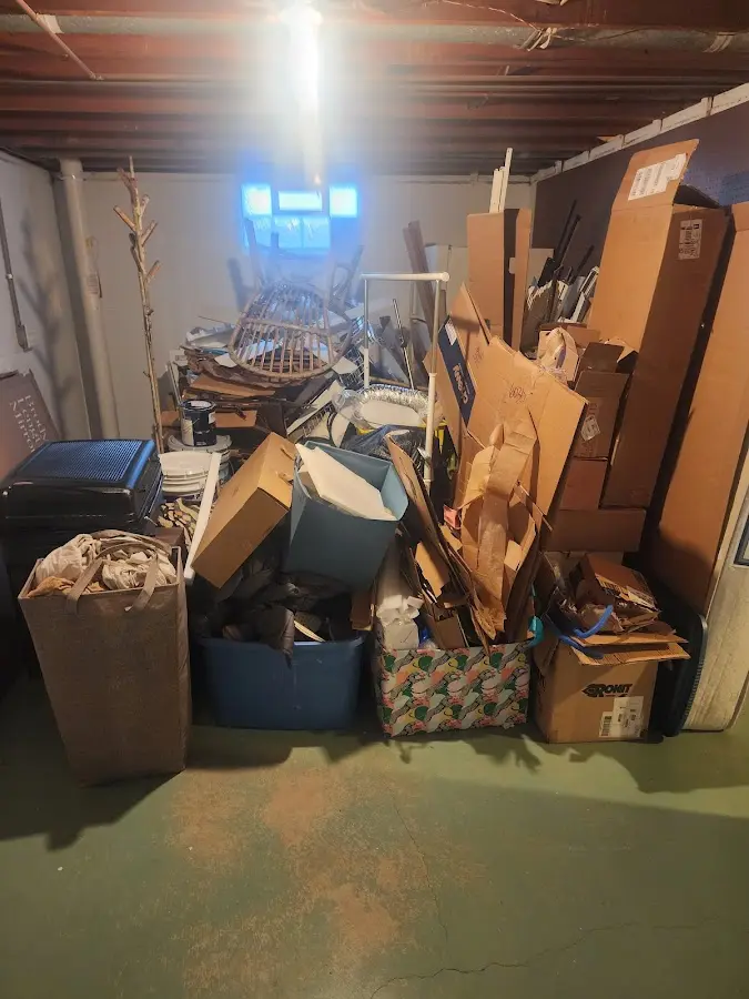 Roll-off dumpster container at job site for 6 Yard Dumpster Rental in Myrtle Grove